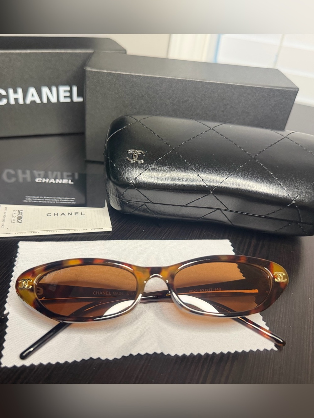 CHANEL Tortoiseshell Oval Sunglasses with Brown Lenses